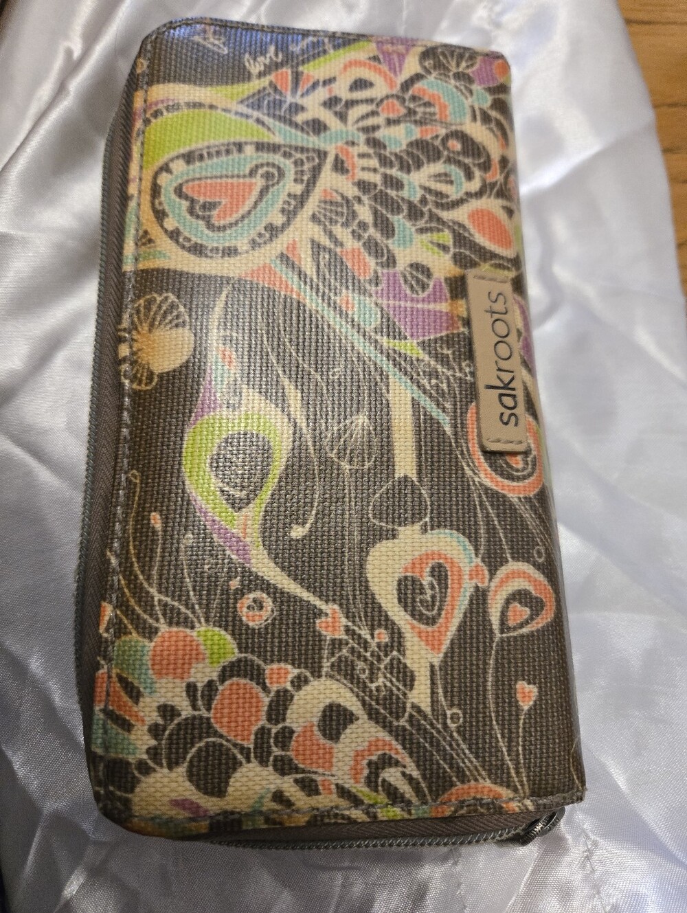 Sakroots Black Zip Wallet with Multicolor Paisley Hearts